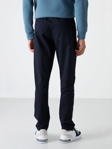 Tommy Life Skinny Sportbroek 'Jogginghose' in Blauw
