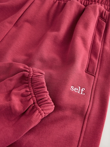 self. Tapered Hose in Rot