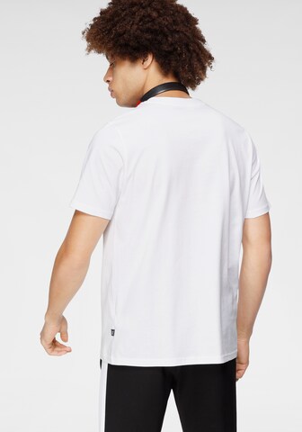 T-Shirt fonctionnel 'Rebel' PUMA en blanc