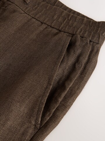 Next Loosefit Hose in Braun