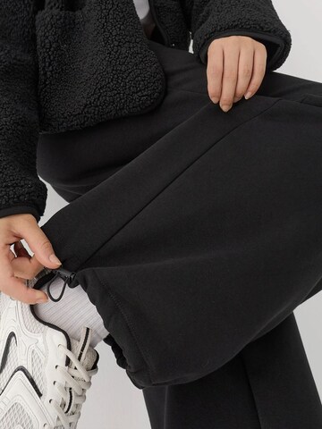 Hiccup - Folgado Calças em preto