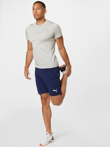 Regular Pantalon de sport 'TeamRise' PUMA en bleu