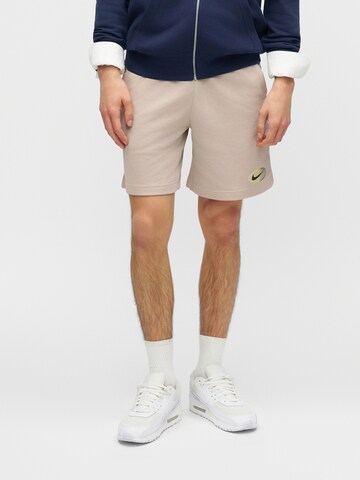 Nike Sportswear regular Παντελόνι 'ATHL CLUB' σε μπεζ: μπροστά