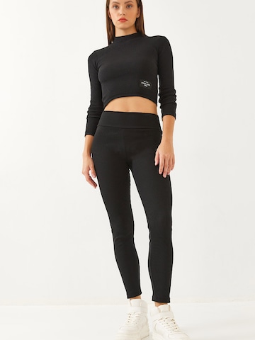 Pantalons de tailleur Bianco Lucci en noir : devant