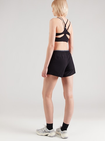 UNDER ARMOUR Normalny krój Spodnie sportowe w kolorze czarny