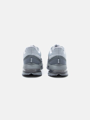 NIKE Juoksukengät 'Pegasus Premium' värissä harmaa