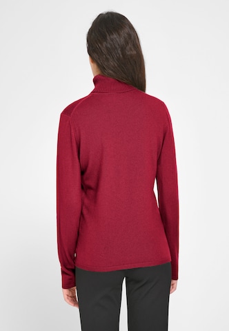 Pull-over include en rouge
