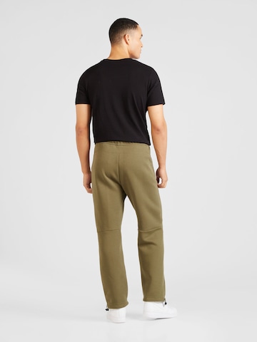 Loosefit Pantalon 'TECH FLEECE' Nike Sportswear en vert