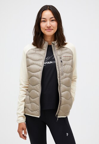 Veste de sport PEAK PERFORMANCE en marron : devant