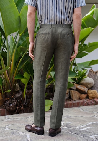 Next Slim fit Trousers 'Signature' in Green