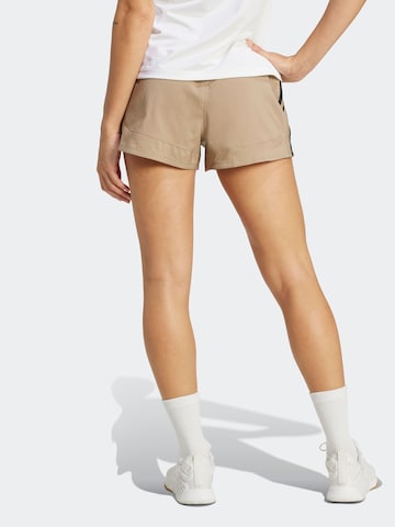Loosefit Pantalon de sport 'PACER' ADIDAS PERFORMANCE en marron