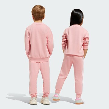 ADIDAS ORIGINALS Joggingdragt 'Adicolor' i pink