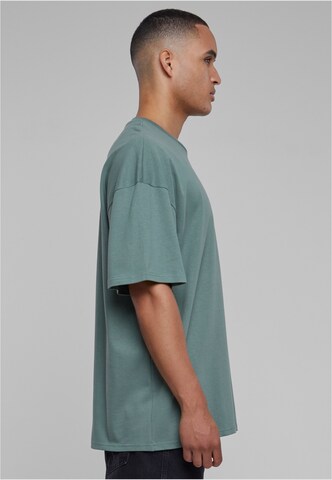 Tricou de la Karl Kani pe verde