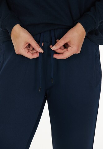 Athlecia Slim fit Workout Pants 'Sella' in Blue