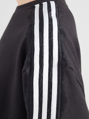 ADIDAS ORIGINALS Sweatshirt i svart