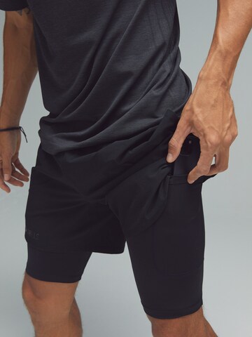 DRILLS Apparel Regular Sports trousers 'XFUNCTION 2-in-1 Shorts' in Black