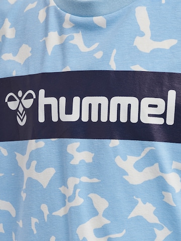 Hummel Shirt 'CARITAS' in Blau