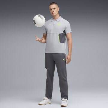 PUMA Loosefit Sportbroek 'Manchester City Pumatech' in Grijs