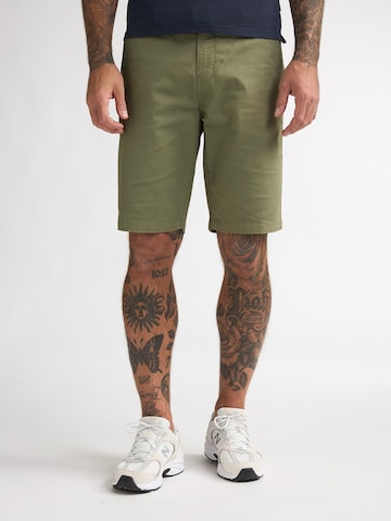 Regular Pantaloni eleganți de la Petrol Industries pe verde: față