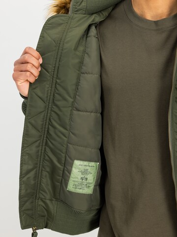 ALPHA INDUSTRIES Between-Season Jacket 'Deflector' in Green: front