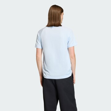 ADIDAS ORIGINALS Poloshirt 'CHEST STRIPES SLIM' in Blau