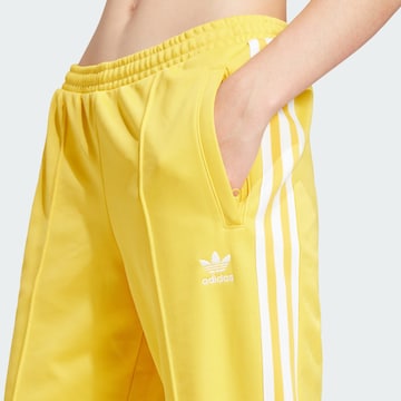 Regular Pantalon 'Montreal' ADIDAS ORIGINALS en jaune