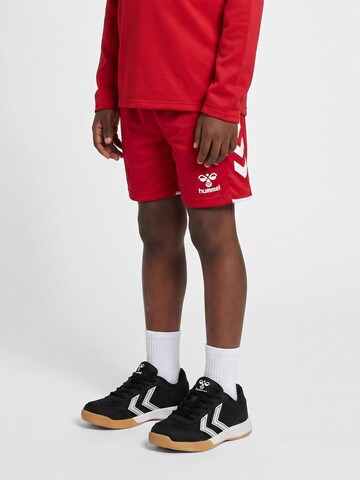 Hummel Regular Sports trousers in Red