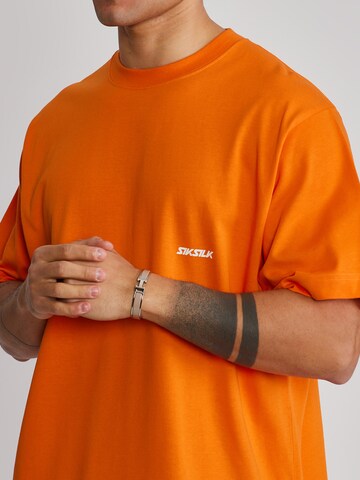 Maglietta di SikSilk in arancione