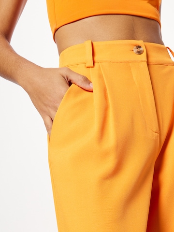 modström Loose fit Pleat-front trousers 'Caya' in Orange