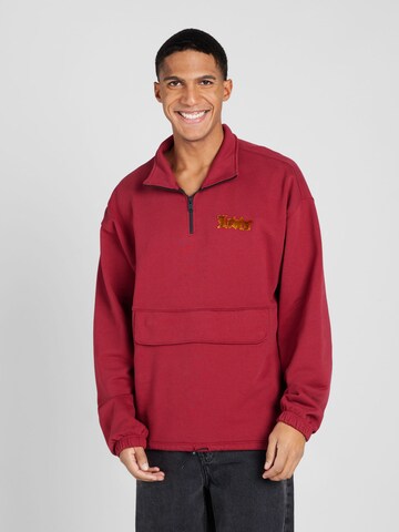 LEVI'S ® Sweatshirt 'RLXD Graphic 1/4 Zip Pch' in Rood: voorkant