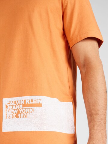 Calvin Klein Jeans T-Shirt 'STENCIL' in Orange