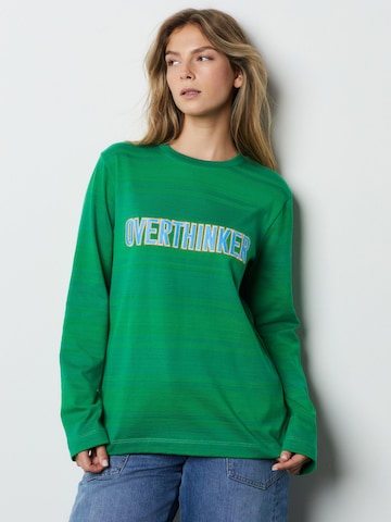 Bluză de molton de la Next pe verde: față