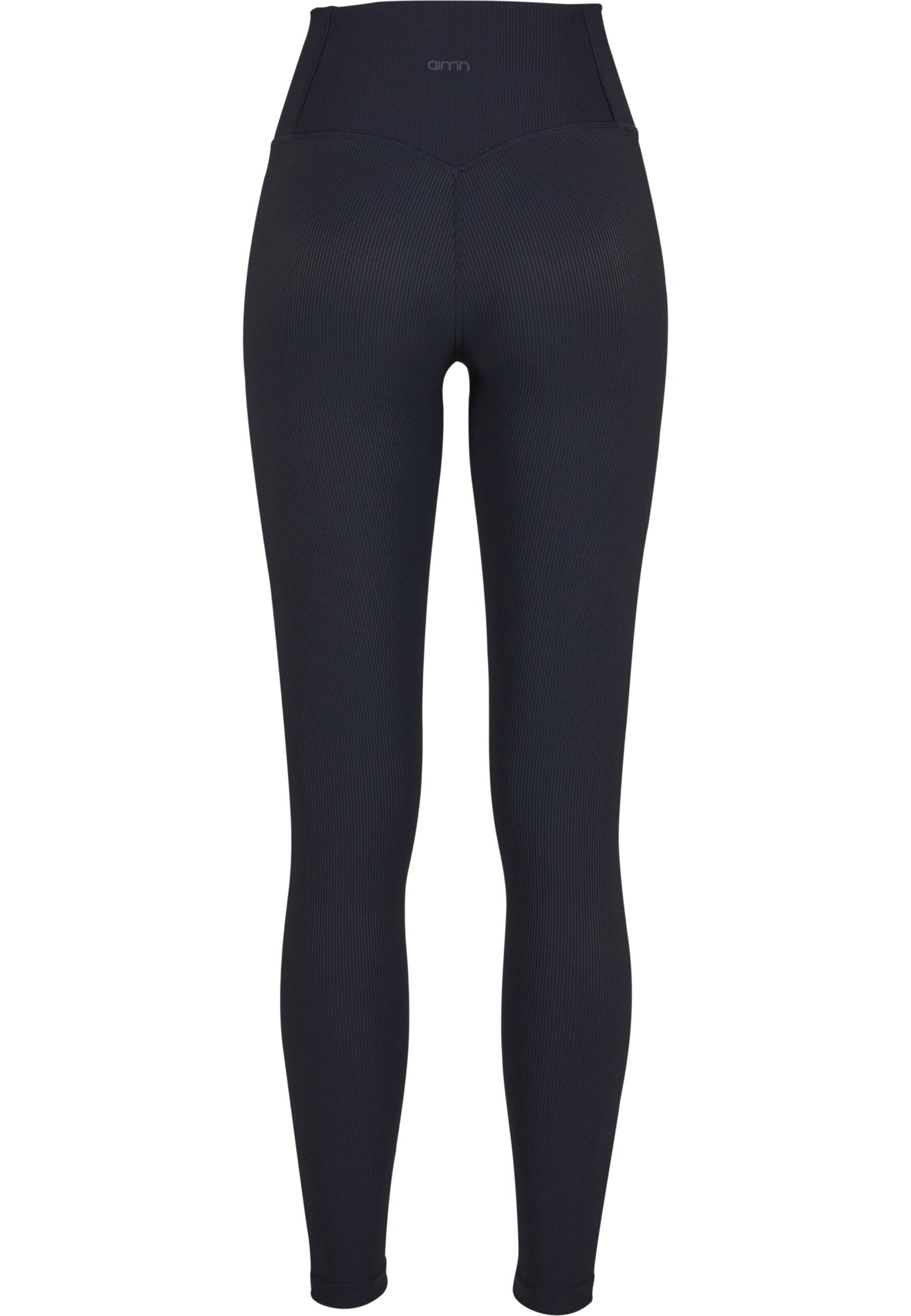 Skinny Pantaloni sportivi di Aim'n in nero