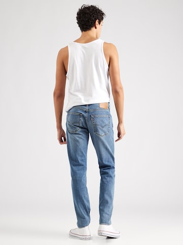 LEVI'S ® Tapered Jeans '512™' i blå