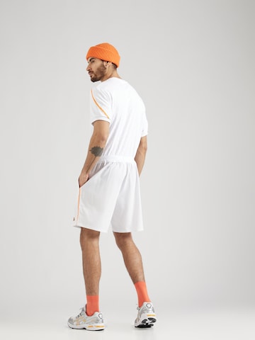 ELLESSE - Regular Calças de desporto 'Tintagel' em branco