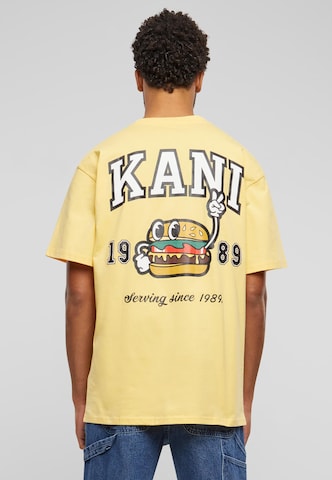 Maglietta 'Burger' di Karl Kani in giallo: frontale