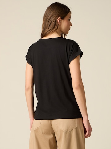 oltre - Camiseta en negro