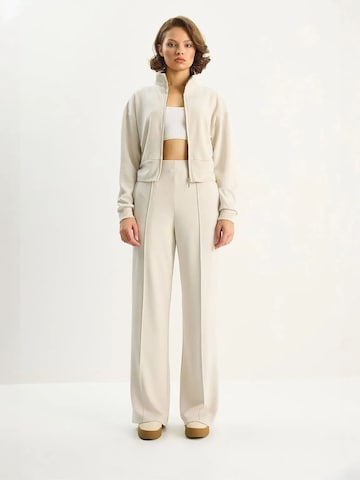 Bianco Lucci - Calças de fato em bege: frente