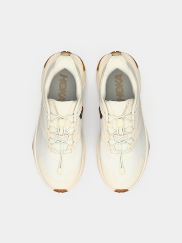 Chaussure de course 'TRANSPORT 2' HOKA en beige