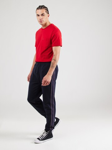 Tapered Pantaloni di TOMMY HILFIGER in blu