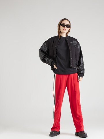 MELA T-shirt 'Madhu' i svart