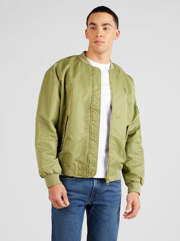 Calvin Klein Jeans Демисезонная куртка в Зеленый: спереди