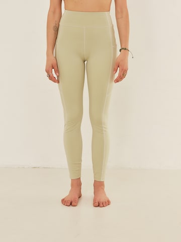 ABOUT YOU x Sofia Tsakiridou Skinny Athletic Pants 'Diana' in Green: front