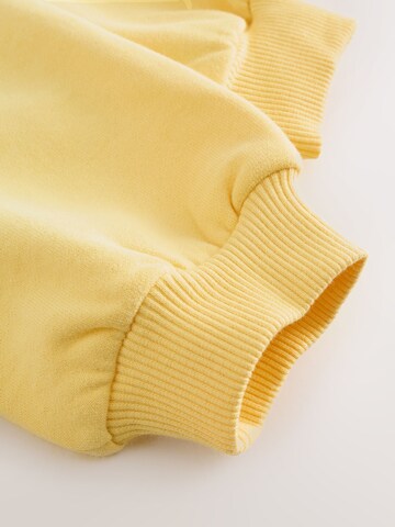 Next Bluzka sportowa w kolorze żółty