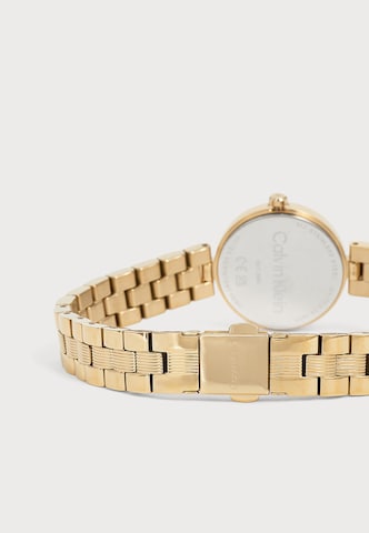 Calvin Klein - Reloj analógico 'Gleam' en oro: atrás