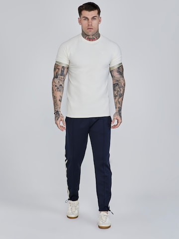 Coupe slim Pantalon de sport SikSilk en bleu