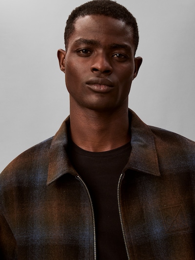 Calvin Klein Veste mi-saison en XS en bleu / marron / brun foncé, Vue avec produit