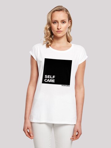 T-shirt 'Self Care' F4NT4STIC en blanc : devant