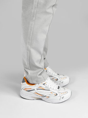 Dutch'D Tenisky 'Arena (Size runs small, order one size up)' – oranžová: přední strana
