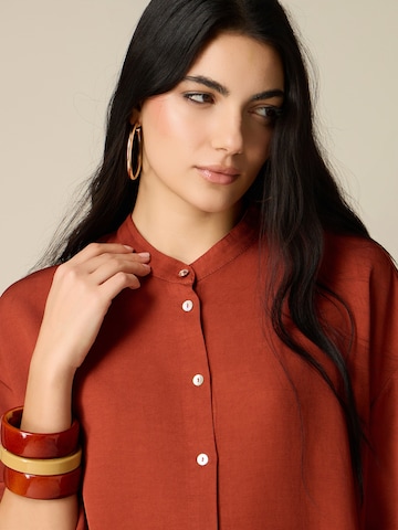 Camicia da donna di oltre in arancione